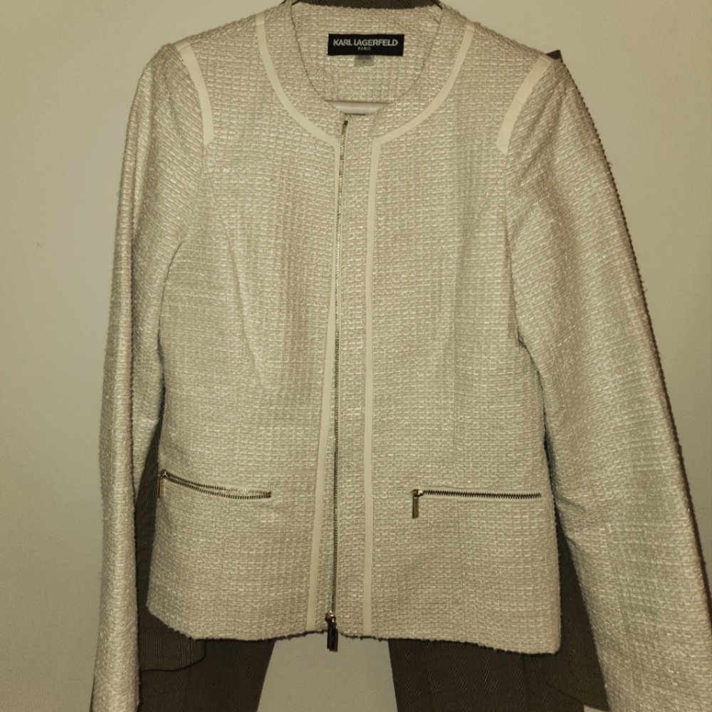 Karl lagerfeld gold zippers in woven sunset under tone to a vanilla weave.